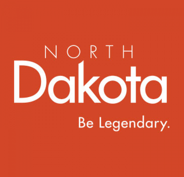 North Dakota Be Legendary logo on Harvest Orange background