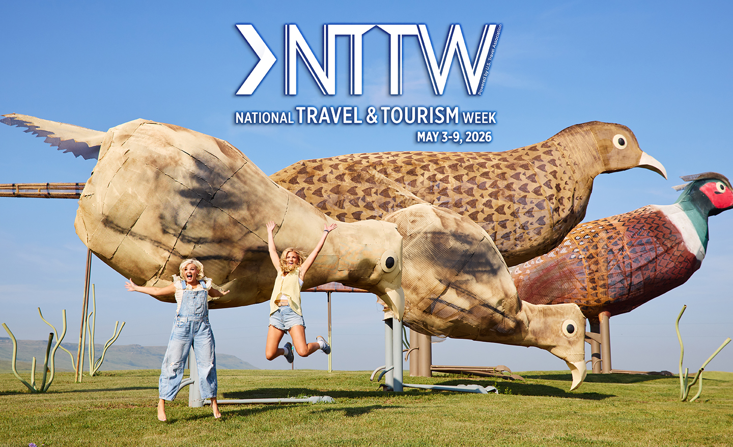 National Travel and Tourism Week 2026 banner featuring Tigirlily and the pheasant statues on the Enchanted Highway