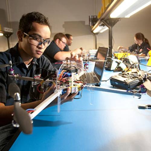 Students work on small unmanned aircrafts