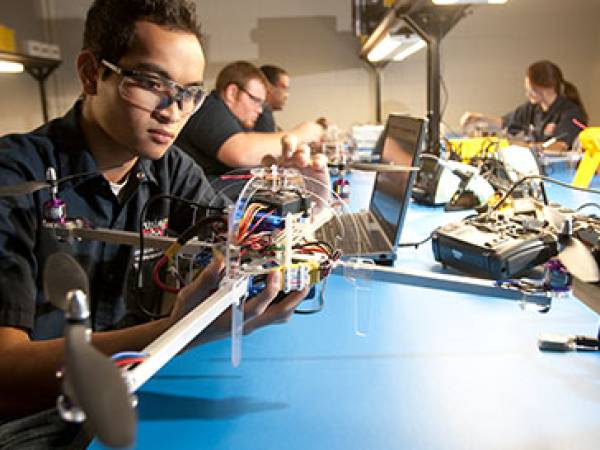 Students work on small unmanned aircrafts