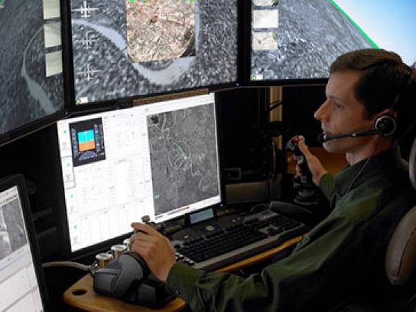 UND student watches remote UAS screens