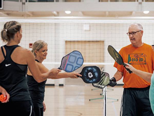 People playing sports at the Two Rivers Activity Center