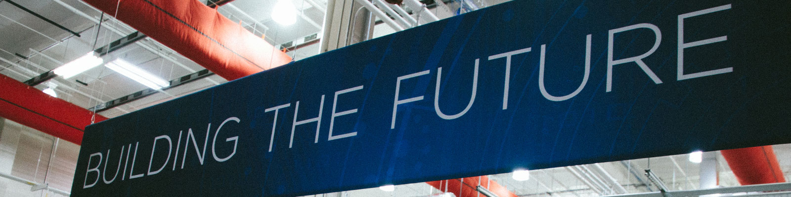 Building the Future sign in a manufacturing facility