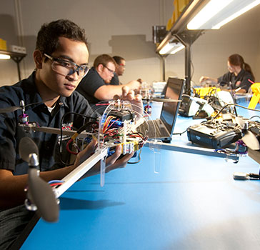 Students work on small unmanned aircrafts