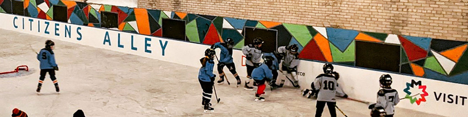 Kids playing hockey at Citizen's Alley