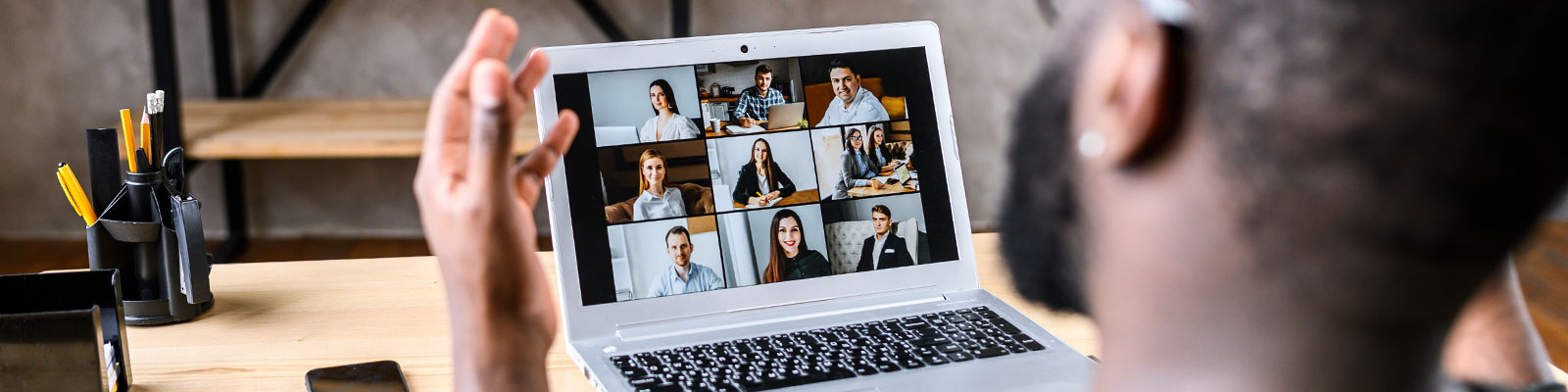 Man participating in online meeting