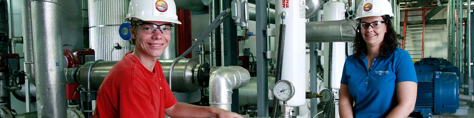 Young man interns in a manufacturing facility 