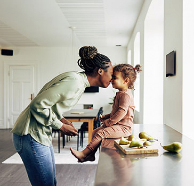 Woman and daughter inside home
